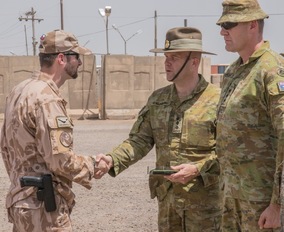 Velitel 6. rotace Task Group Taji plukovník Robert Kent Calhoun