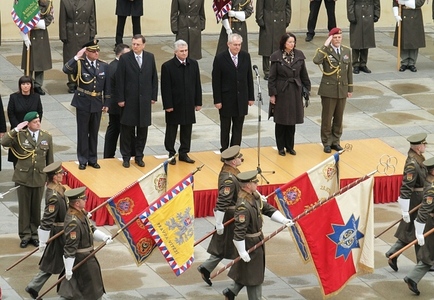 Historical flags are borne away after the parade