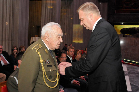 2 WW veteran, Dukla's fights participant, Brigadier General Miloslav Masopust, receives the State Defence Cross from minister Vlastimil Picek