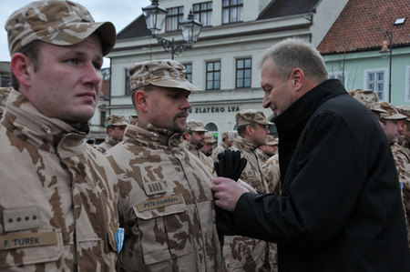 Deputy Vlastimil Picek hands over medals for service to soldiers