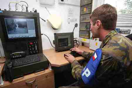 WO1 Michal Vagner monitors surroundings of the base