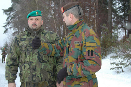Czech liaison officer Captain Jaroslav Tuma talks with chief of operations group of Belgian soldiers