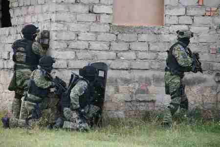 Croatian military policemen attacking