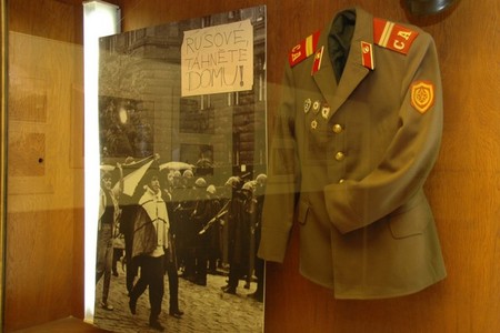 Exhibits from collections of the Military History Institute include period posters and uniforms
