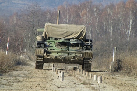 Driving along alley through a minefield  