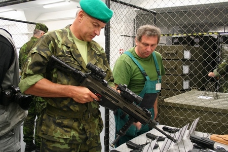 General Maleninsky checks a new assault rifle