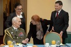 Colonel Antonin Bukovy shakes hands with Ms. Lenka Ptackova Melicharova, Deputy Defence Minister for Personnel