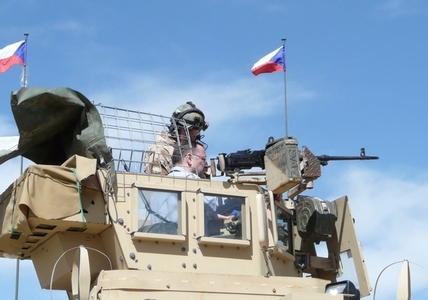 PM Necas in tower of a MRAP vehicle which Czech soldiers use in Wardak