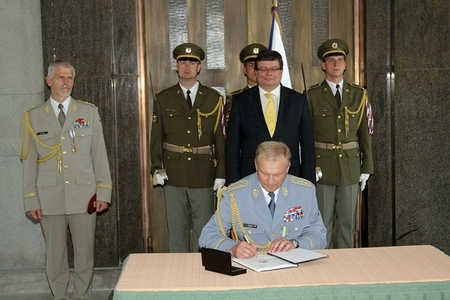 General Vlastimil Picek signs the change of command protocol