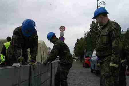 Personnel of the Active Reserve erecting anti-flood barriers along the Moldau River in Prague during exercise (Aug 2012, Czech Republic)