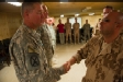 Czech Defence Minister Martin Barták (right) awards commander of US Task Force Spartan COL David B. Haight with Czech medal