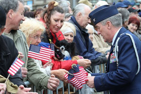 Onlookers interested in US flags
